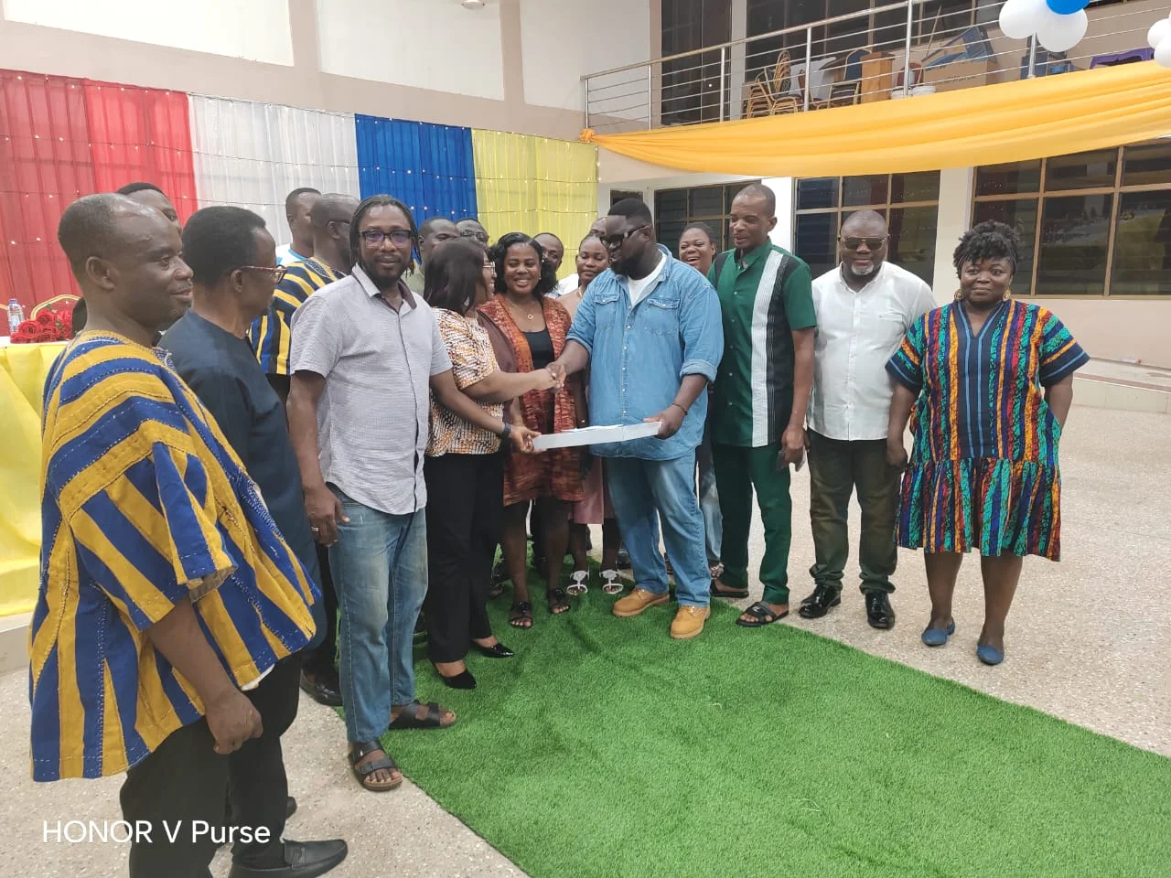 Students making a presentation to the Head of Department