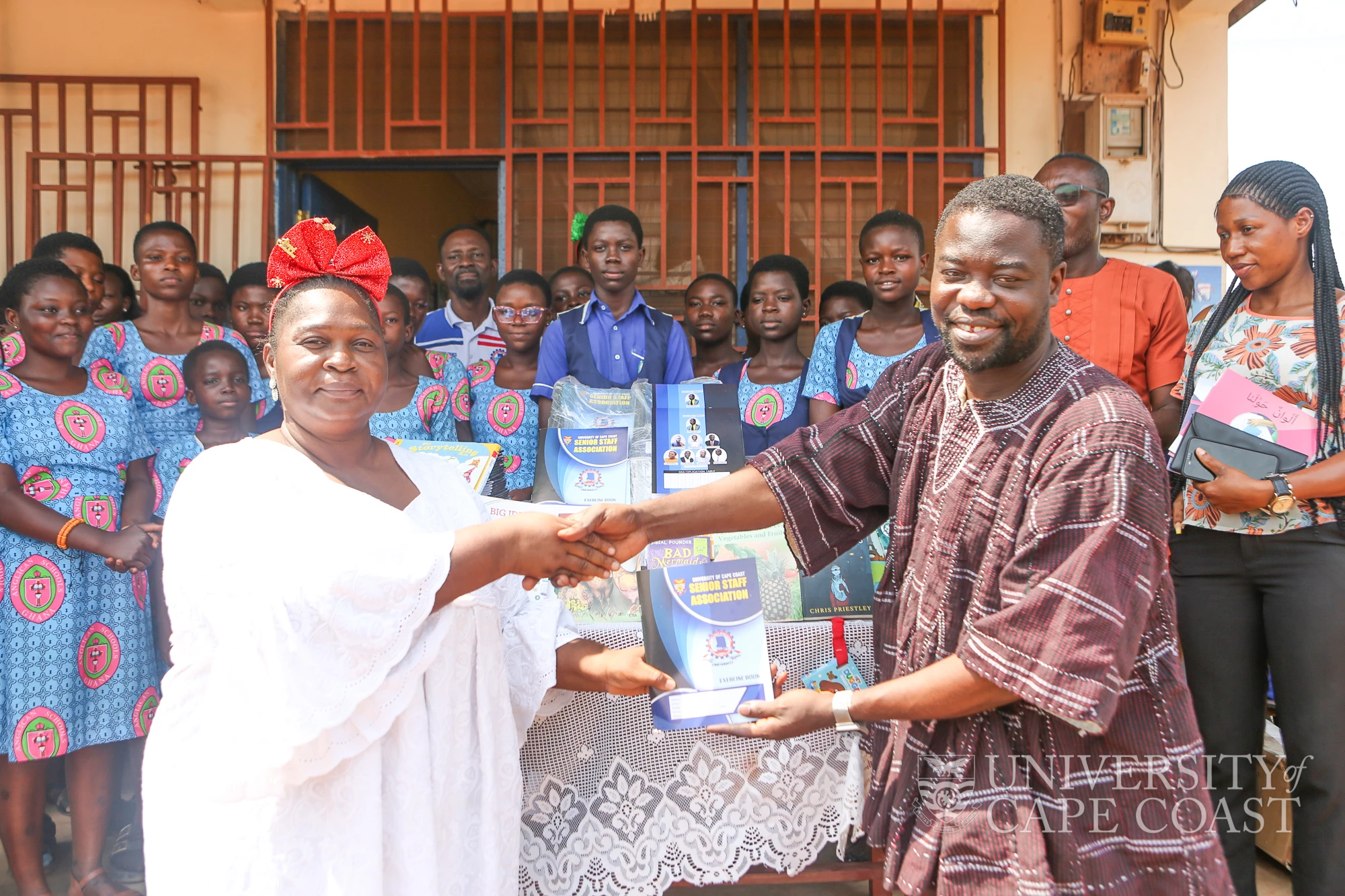 SSA-UCC Distributes Books to Four Basic Schools