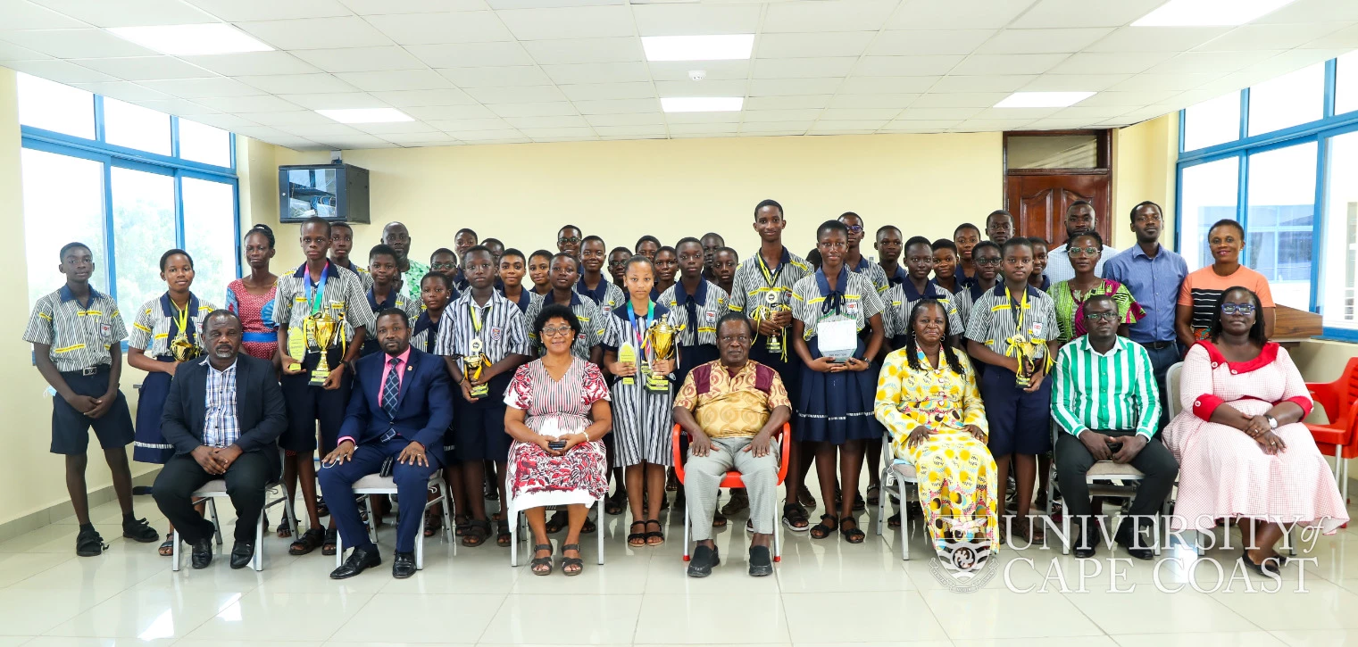 UCC Spelling Bee Winners Present Awards to Management